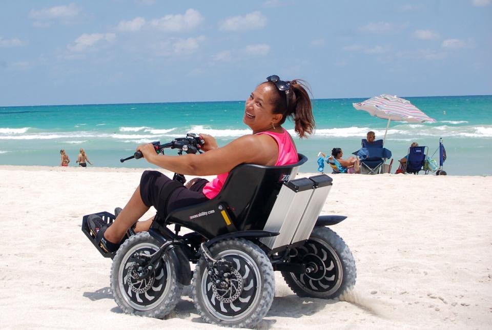 Zoom wheelchair on beach